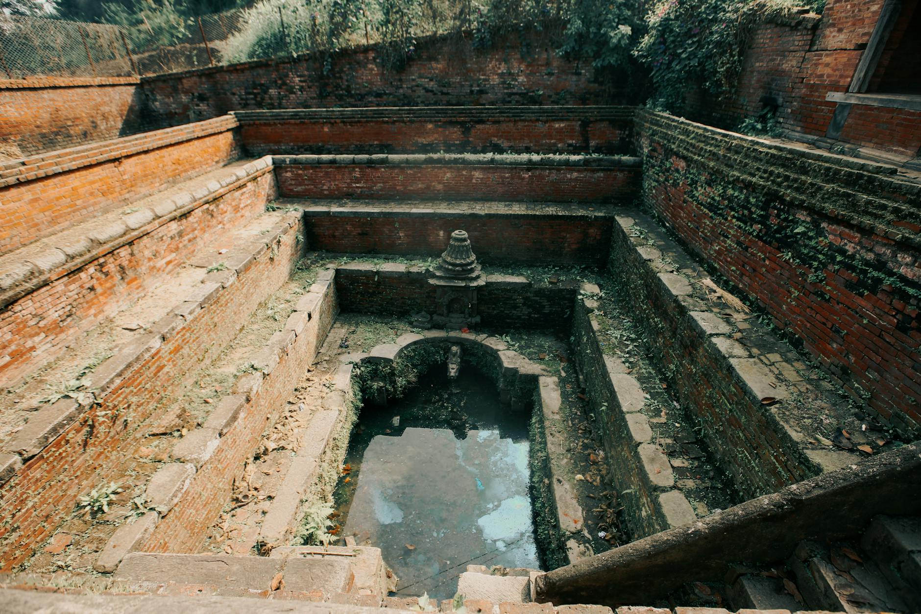 Explore this ancient stepped tank with distinct architectural features and historical charm.